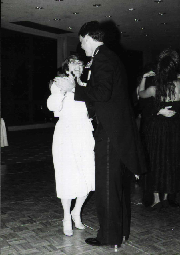 Sister Beth Butler O.P. dancing with senior student Gabe Orenic at the Spring Formal, 1989